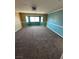Spacious bedroom with chair rail, light-colored carpeting, and a ceiling fan at 3917 White Castle St, Las Vegas, NV 89129
