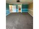 Spacious bedroom with chair rail, light-colored carpeting, and a ceiling fan at 3917 White Castle St, Las Vegas, NV 89129