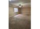 Bonus room features neutral paint and carpet with a ceiling fan at 3917 White Castle St, Las Vegas, NV 89129