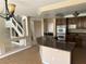 Modern kitchen featuring a granite island, stainless steel appliances, and an open floor plan at 3917 White Castle St, Las Vegas, NV 89129
