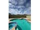 Enjoy a private backyard swimming pool and spa with beautiful blue tile accents at 3917 White Castle St, Las Vegas, NV 89129