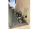 Side yard featuring pool equipment, including a filter, pump, and other components at 3917 White Castle St, Las Vegas, NV 89129