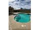 Resort-style backyard swimming pool with an attached spa and ample deck space at 3917 White Castle St, Las Vegas, NV 89129