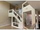 Open staircase design with glass railing details, with abundant natural light in a spacious foyer at 3917 White Castle St, Las Vegas, NV 89129