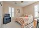 Cozy bedroom with bright windows, plantation shutters, and comfortable furnishings at 4705 Bersaglio St, Las Vegas, NV 89135