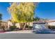 Charming single-story home with a well-manicured front yard and a two-car garage at 4705 Bersaglio St, Las Vegas, NV 89135