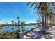 Beautiful lake view from a patio in a community with palm trees at 4705 Bersaglio St, Las Vegas, NV 89135