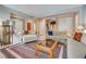 Spacious living room with tile floors, ample seating, and an open floor plan at 4705 Bersaglio St, Las Vegas, NV 89135