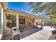 Covered patio with ample seating space, perfect for outdoor dining and entertaining at 4705 Bersaglio St, Las Vegas, NV 89135