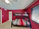 Bedroom showcases a bunk bed, window with blinds, and closet at 4756 Lake Pl, Las Vegas, NV 89147