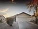 Charming single-story home featuring a two-car garage and low-maintenance landscaping at 4841 Crystal Sword St, North Las Vegas, NV 89031