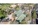 Aerial view of the community tennis courts surrounded by mature trees and lush greenery at 5221 Crooked River Cir, Las Vegas, NV 89149