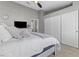 Bedroom featuring a neutral color scheme and a closet at 5945 Sunlight Garden Way, Las Vegas, NV 89118