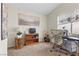 Cozy carpeted bedroom with a window and a desk area for a functional and comfortable space at 6611 Cinnabar Coast Ln, North Las Vegas, NV 89084