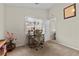 Inviting bedroom featuring natural light and a dedicated workspace for a versatile living area at 6611 Cinnabar Coast Ln, North Las Vegas, NV 89084