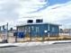 Exterior view of the property with a fenced yard, providing a blank canvas for outdoor activities and gatherings at 703 Madison Ave, Las Vegas, NV 89106