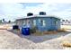Inviting single-story exterior with a gravel front yard, close to urban amenities and city skyline views at 703 Madison Ave, Las Vegas, NV 89106