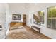 Bright entryway with wood floors, white walls, and a vaulted ceiling at 7307 Iron Oak Ave, Las Vegas, NV 89113
