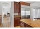 Modern kitchen with stainless steel appliances and granite countertops at 7307 Iron Oak Ave, Las Vegas, NV 89113