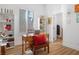 Bright office featuring a desk, hardwood floors, and ample shelving at 7307 Iron Oak Ave, Las Vegas, NV 89113