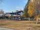Community playground featuring play structures, covered seating, and green space at 7307 Iron Oak Ave, Las Vegas, NV 89113