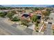 Desert home with solar panels, a circular drive, and xeriscaping at 8880 W La Mancha Ave, Las Vegas, NV 89149