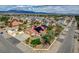 Aerial shot displays desert property featuring solar panels and inviting landscape at 8880 W La Mancha Ave, Las Vegas, NV 89149