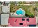 Overhead view of a home with a private backyard pool, patio, and garden at 8880 W La Mancha Ave, Las Vegas, NV 89149