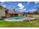 Enjoy the view of this pool and spa complemented by a spacious yard for relaxation and outdoor activities at 8880 W La Mancha Ave, Las Vegas, NV 89149