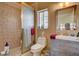 This bathroom features a shower and a vanity with drawers and a mirror at 8880 W La Mancha Ave, Las Vegas, NV 89149