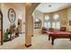 Open room with arches, pool table and seating area with decorative design at 8880 W La Mancha Ave, Las Vegas, NV 89149
