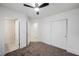 This bedroom includes carpet, a ceiling fan, closet space, and easy access to the ensuite bathroom at 9050 W Tropicana Ave # 1178, Las Vegas, NV 89147