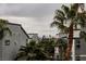 View of the exterior showing surrounding buildings and palm trees at 9050 W Tropicana Ave # 1178, Las Vegas, NV 89147