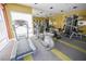 Community gym with modern exercise equipment and large mirror at 9050 W Tropicana Ave # 1178, Las Vegas, NV 89147