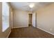Bedroom featuring neutral walls, carpet flooring, a ceiling fan, and closet doors at 9445 Sweetwood Ave, Las Vegas, NV 89149