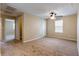 Large bedroom with neutral walls, carpet, access to ensuite bathroom and closet at 9445 Sweetwood Ave, Las Vegas, NV 89149