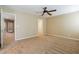 Spacious bedroom with neutral walls, carpet, doorways, and ample natural light at 9445 Sweetwood Ave, Las Vegas, NV 89149