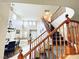Inviting entryway showcases a grand staircase, high ceilings, and a view of the dining and living areas at 9670 Gentle Spirit Dr, Las Vegas, NV 89148