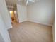 Bedroom with neutral walls and flooring, featuring a ceiling fan and natural light at , Las Vegas, NV 89130