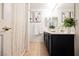 Charming bathroom featuring a shower and a vanity with modern fixtures at 10341 Birch Bluff Ln, Las Vegas, NV 89145