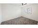 Bright and open bedroom space with natural light and a ceiling fan at 10341 Birch Bluff Ln, Las Vegas, NV 89145