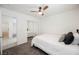Bedroom featuring a ceiling fan, queen bed, and a closet at 10341 Birch Bluff Ln, Las Vegas, NV 89145