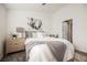 Well-lit bedroom with fresh decor, neutral color palette, and a ceiling fan at 10341 Birch Bluff Ln, Las Vegas, NV 89145