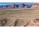 Expansive desert landscape with rugged terrain and vast open spaces, providing a unique natural setting at 10341 Birch Bluff Ln, Las Vegas, NV 89145