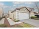 Charming single Gathering home featuring a two-car garage and well-maintained landscaping at 10341 Birch Bluff Ln, Las Vegas, NV 89145