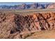 Amazing views of the Red Rock Mountains, offering a scenic backdrop for outdoor adventures and exploration at 10341 Birch Bluff Ln, Las Vegas, NV 89145