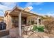 Entertaining covered patio with a grill, fire pit, seating and inviting space for gatherings and relaxation at 1050 Cracker Barrel Cir, Mesquite, NV 89034