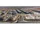 An aerial view of a new housing community featuring townhomes and a community pool at 11439 Peak Landing Ave, Las Vegas, NV 89138