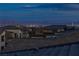 Las Vegas city view from the roof of a new home at dusk at 11439 Peak Landing Ave, Las Vegas, NV 89138