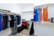 Spacious walk-in closet with wood floor, lots of shelving, and plenty of storage at 11439 Peak Landing Ave, Las Vegas, NV 89138